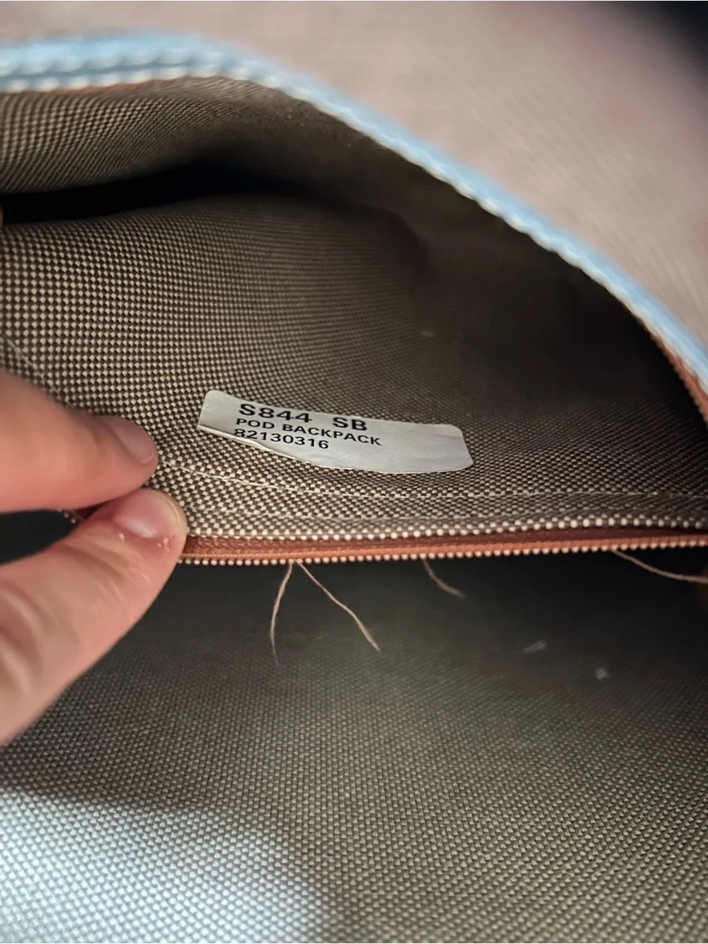 Dooney & Bourke “Pod Backpack” light blue